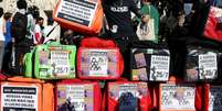 Manifestantes pretendem sair do estádio do Pacaembu, em São Paulo, e irem até a sede do iFood, em Osasco, na Grande São Paulo.  Foto: Rovena Rosa/AB